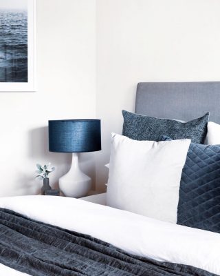 BLUMARINE | not only an iconic italian fashion label but a fair description for this captivating blue clad bedroom featuring soft shifts of tone and colour complemented by a captivating print emulating a sea inspired aesthetic Ocean Breeze from @arthouseco 
#localepropertystylists